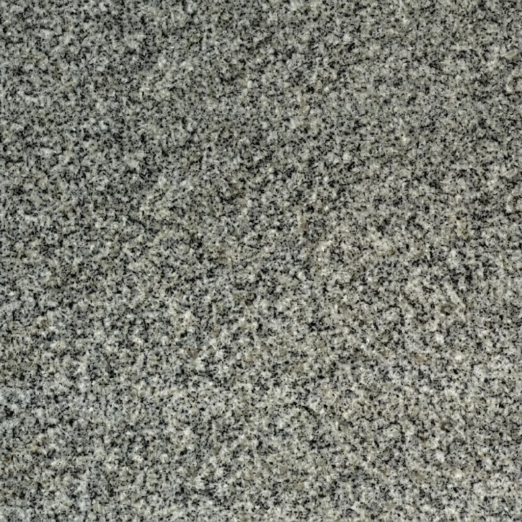 Гранит Kuru Grey — светло-серый камень для лаконичного памятника